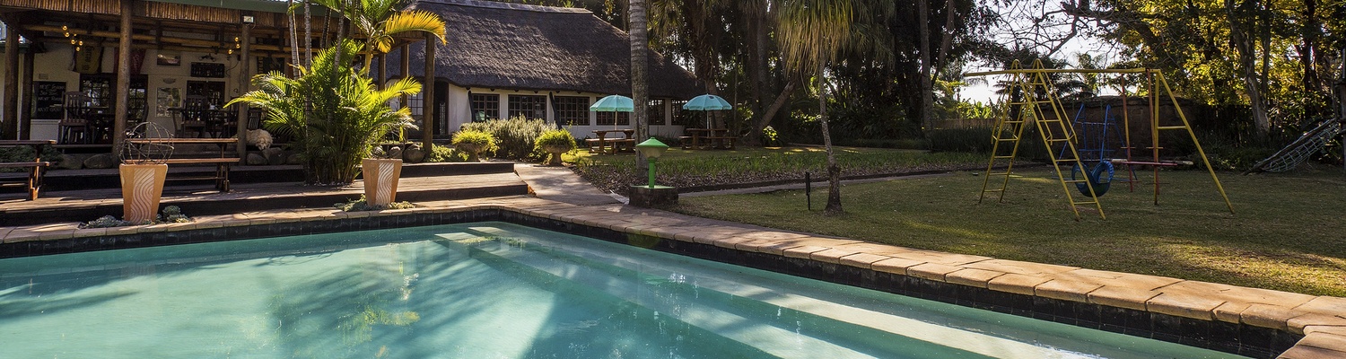 Outdoor pool at Nabana Lodge accommodation near Hazyview
